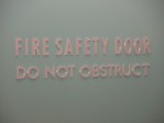 Fire safety door do not obstruct,  50mm & 30mm high lettering, 3.0mm thick  *UPDATED TEXT*
